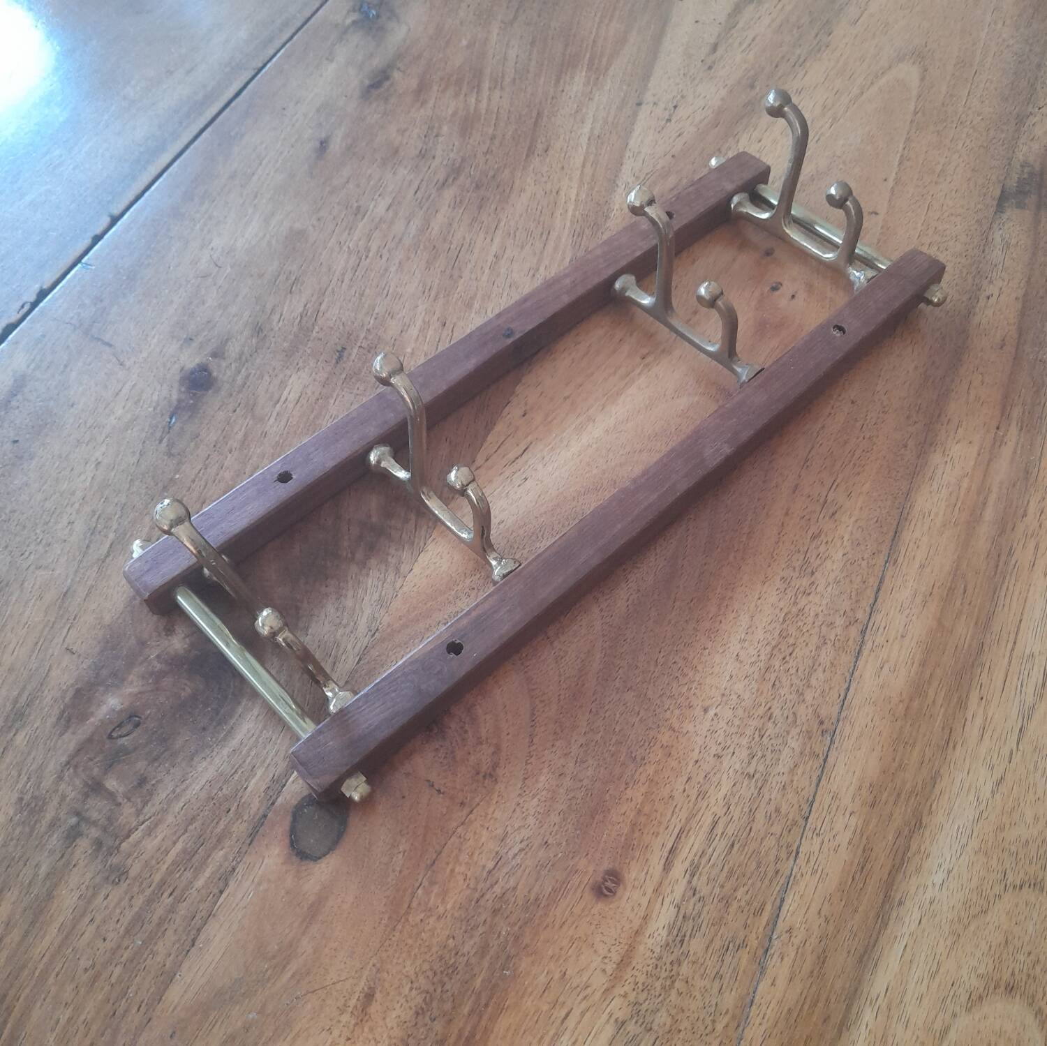 Brass coat hooks