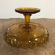 1900 fruit cup in amber pressed glass.