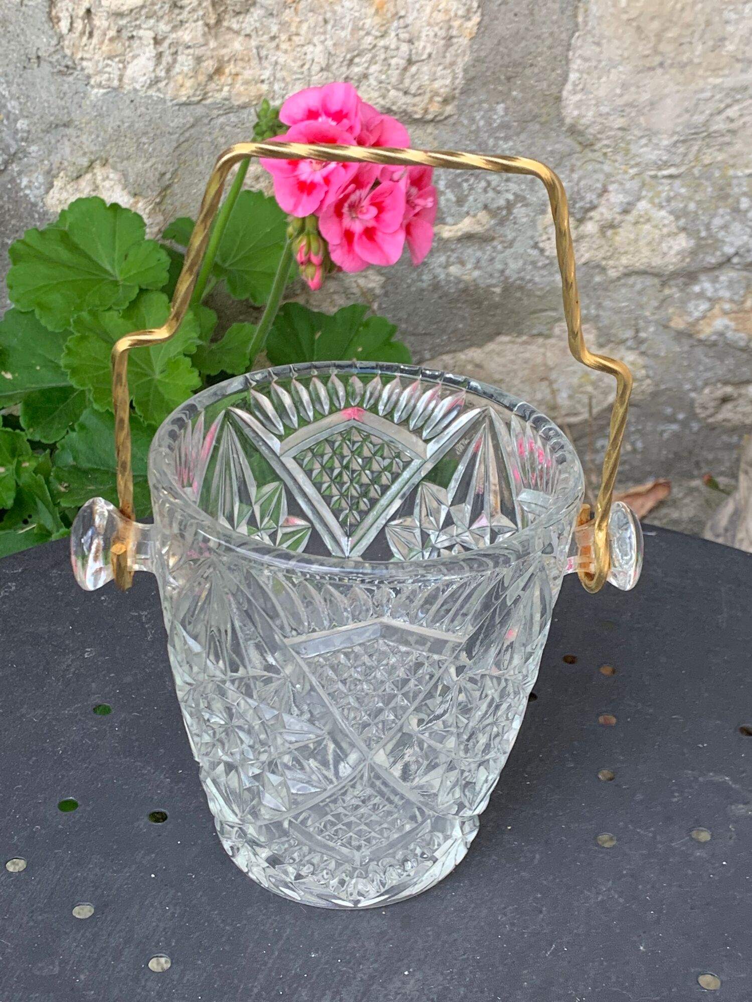 Ice bucket and whiskey decanter made of vintage chiseled transparent glass
