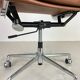 Fauteuil en cuir brun haut dossier soft pad group Eames ICF pour Herman Miller
