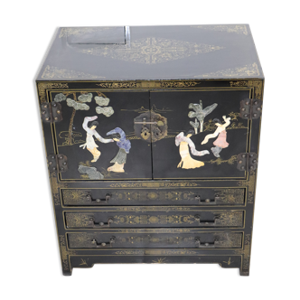 Black lacquered Chinese buffet with stone and ivory figures