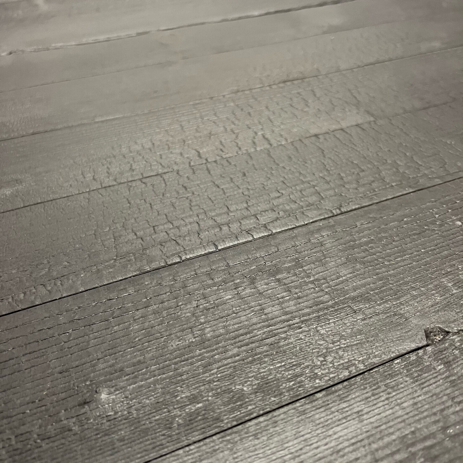 Brutalist round table in burnt wood yakisugi