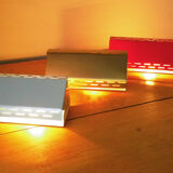 Wall lamp with red swivel shutter