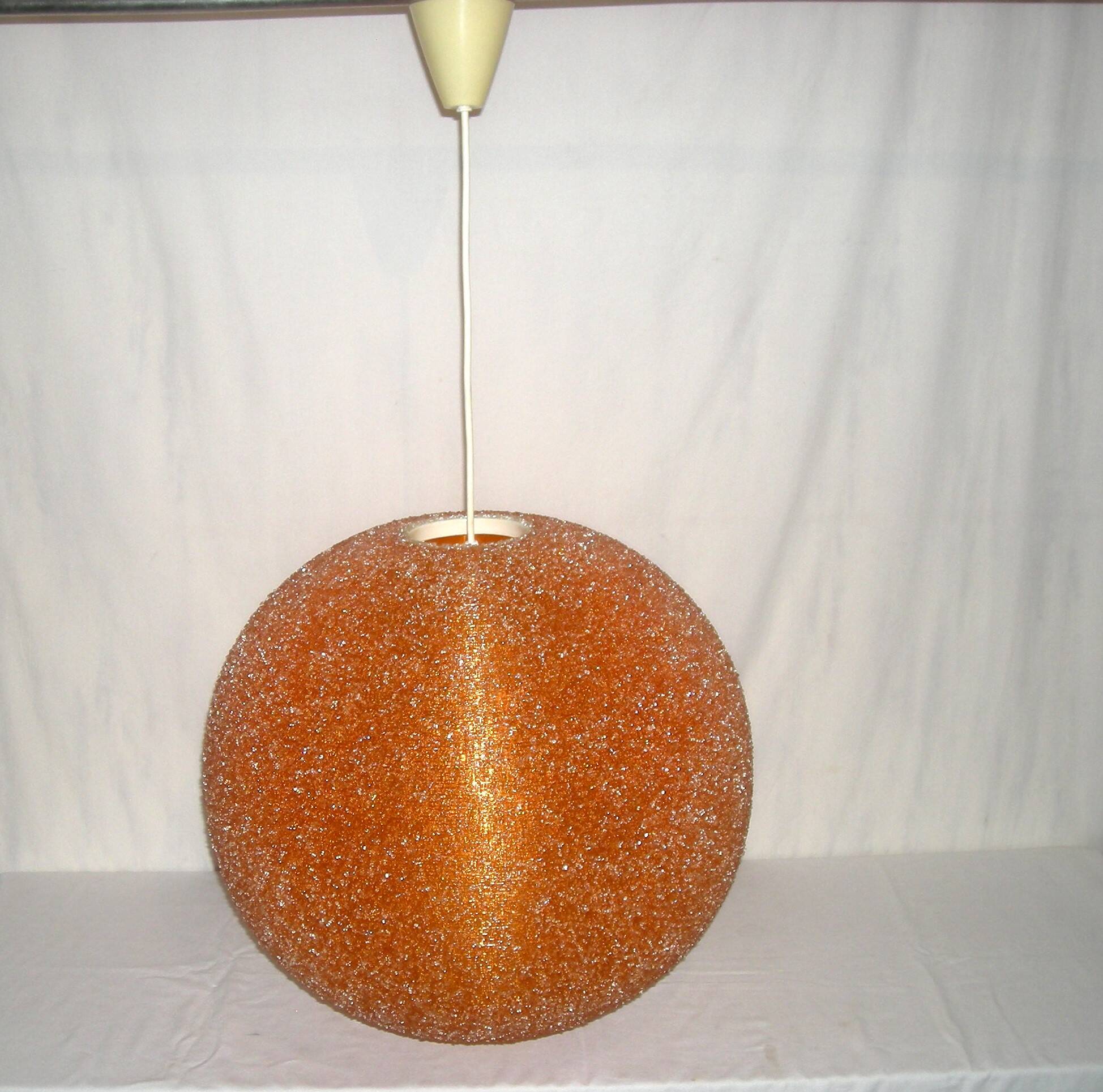 Suspension orange Sugar ball by John and Sylvia Reid from the 1960s.