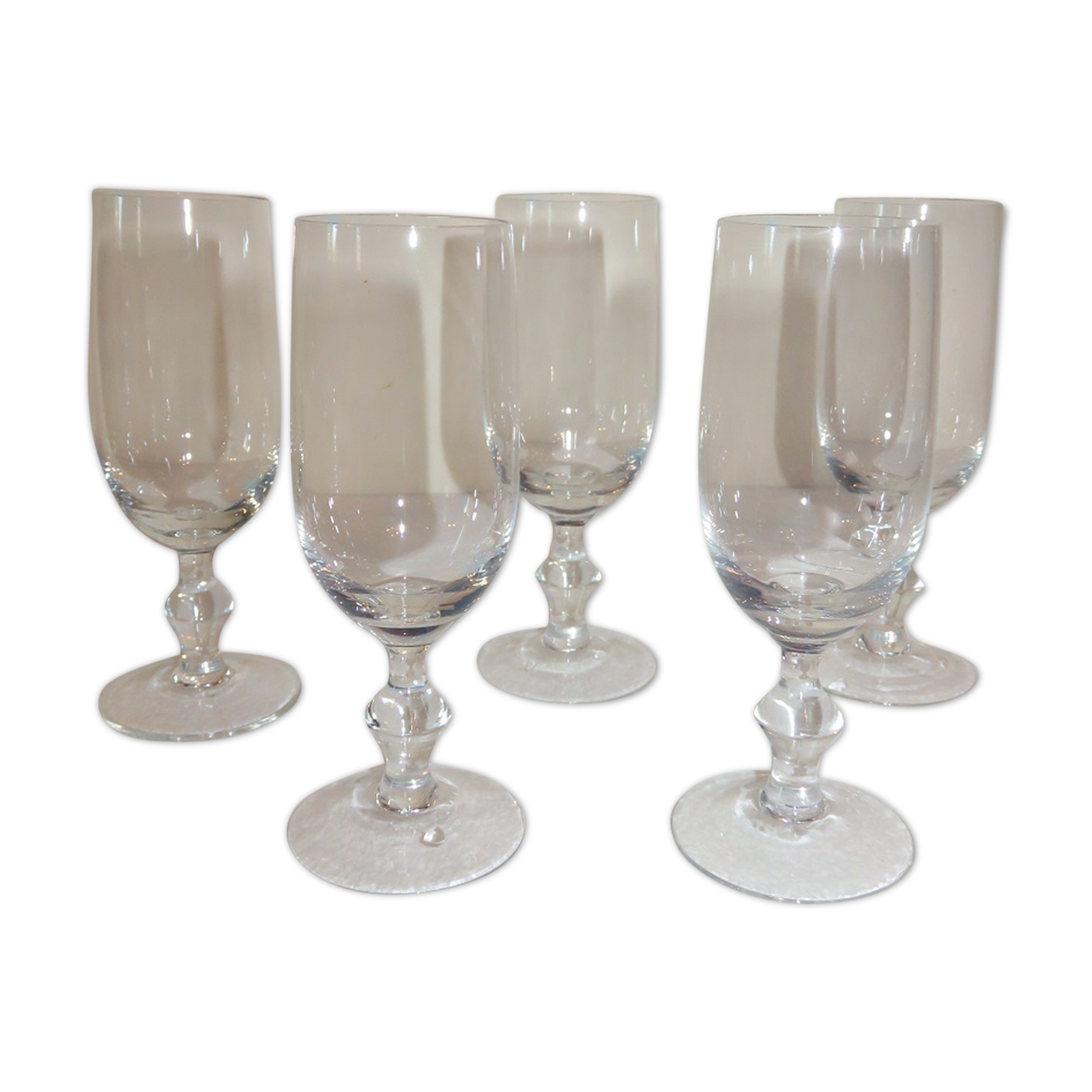 Suite de 5 flûtes à champagne