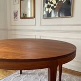 Round extendable rosewood table from the 70s