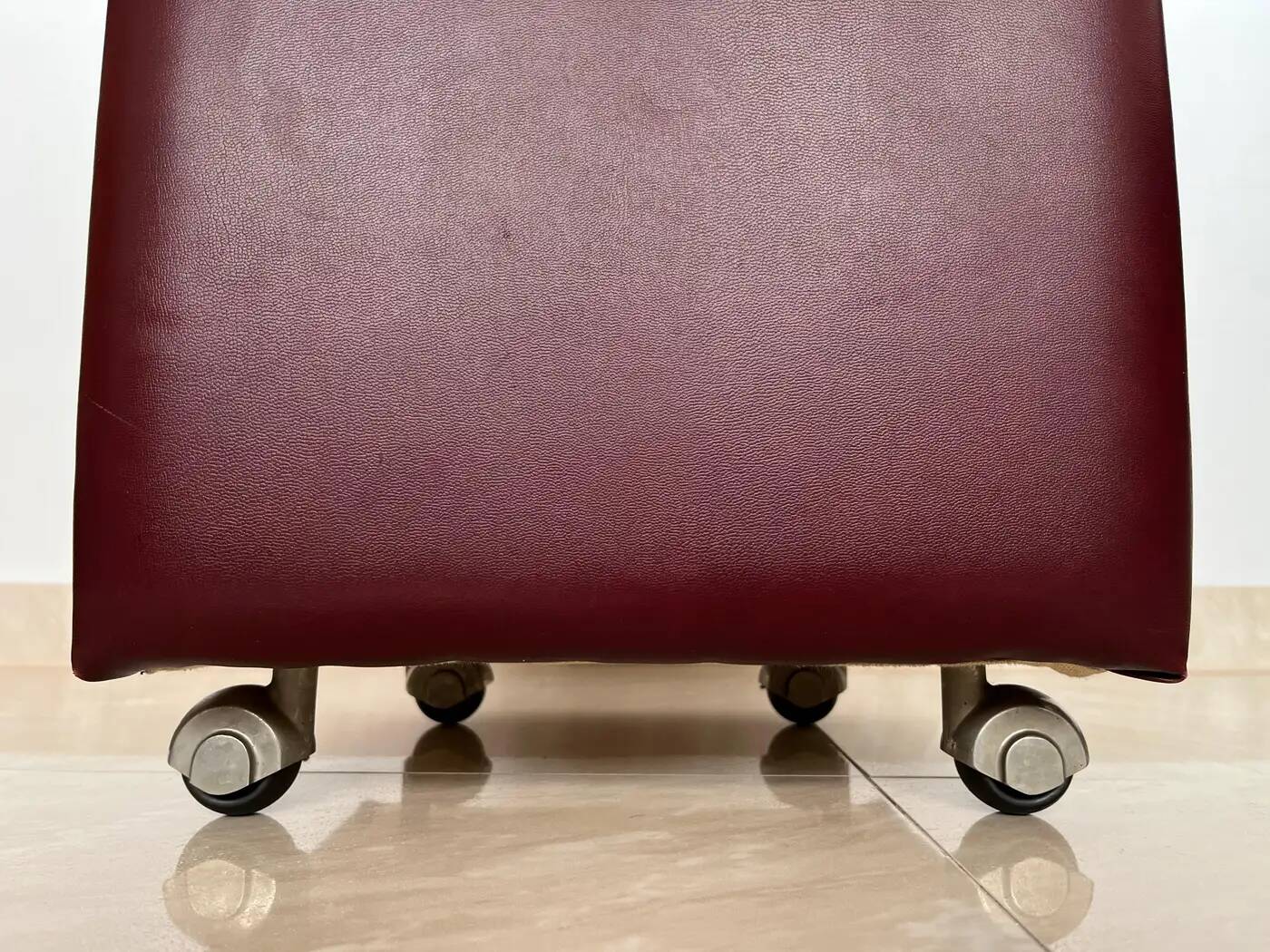 Pair of midcentury design wheel stools or tabourets, artificial leather, 1970s