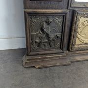 Renaissance-style mirror in wood and copper with a craftsmanship theme.