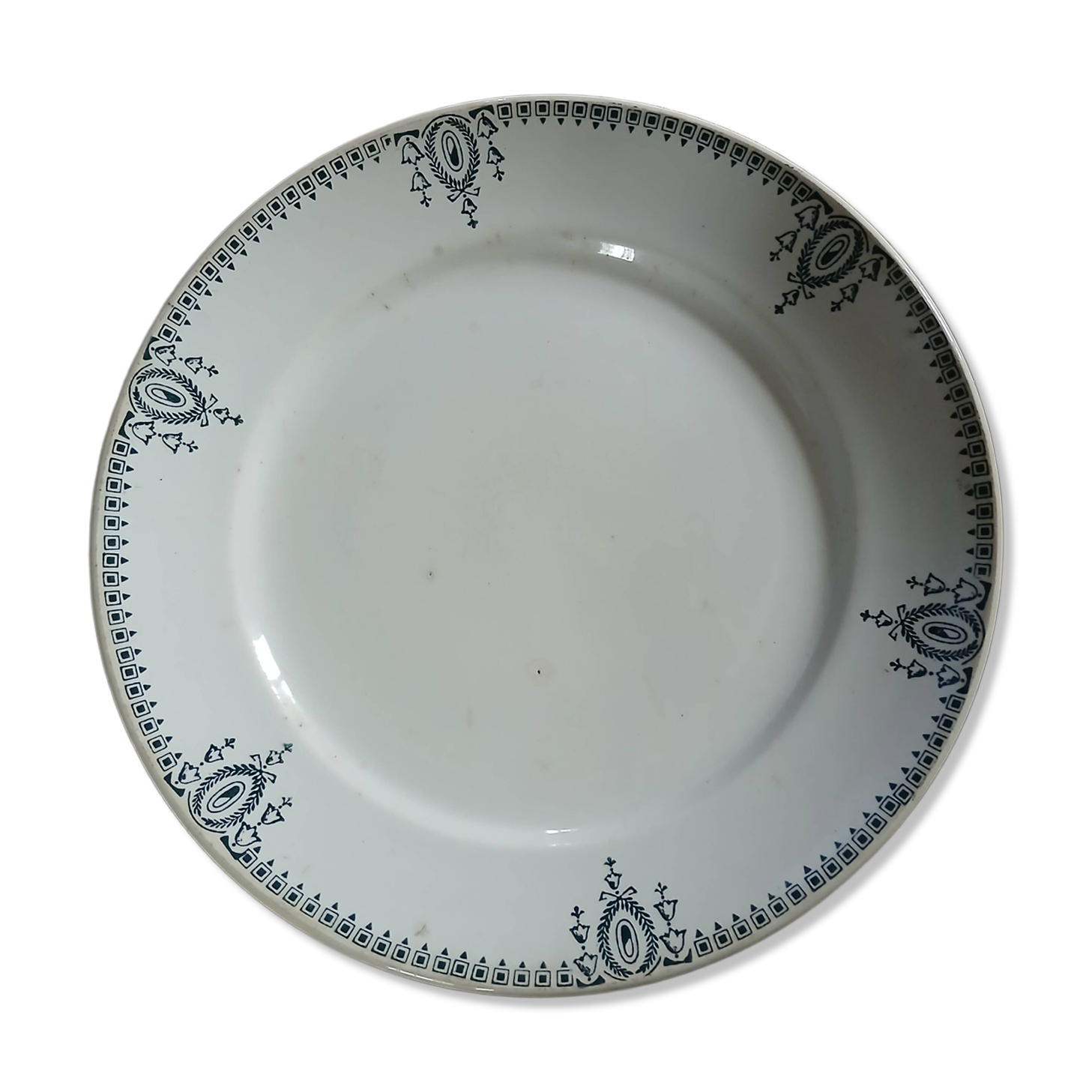 Old round plate made of ironstone