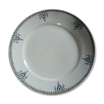 Plat rond ancien en terre de fer