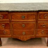 Transition style chest of drawers in rosewood and amaranth veneer, 20th century