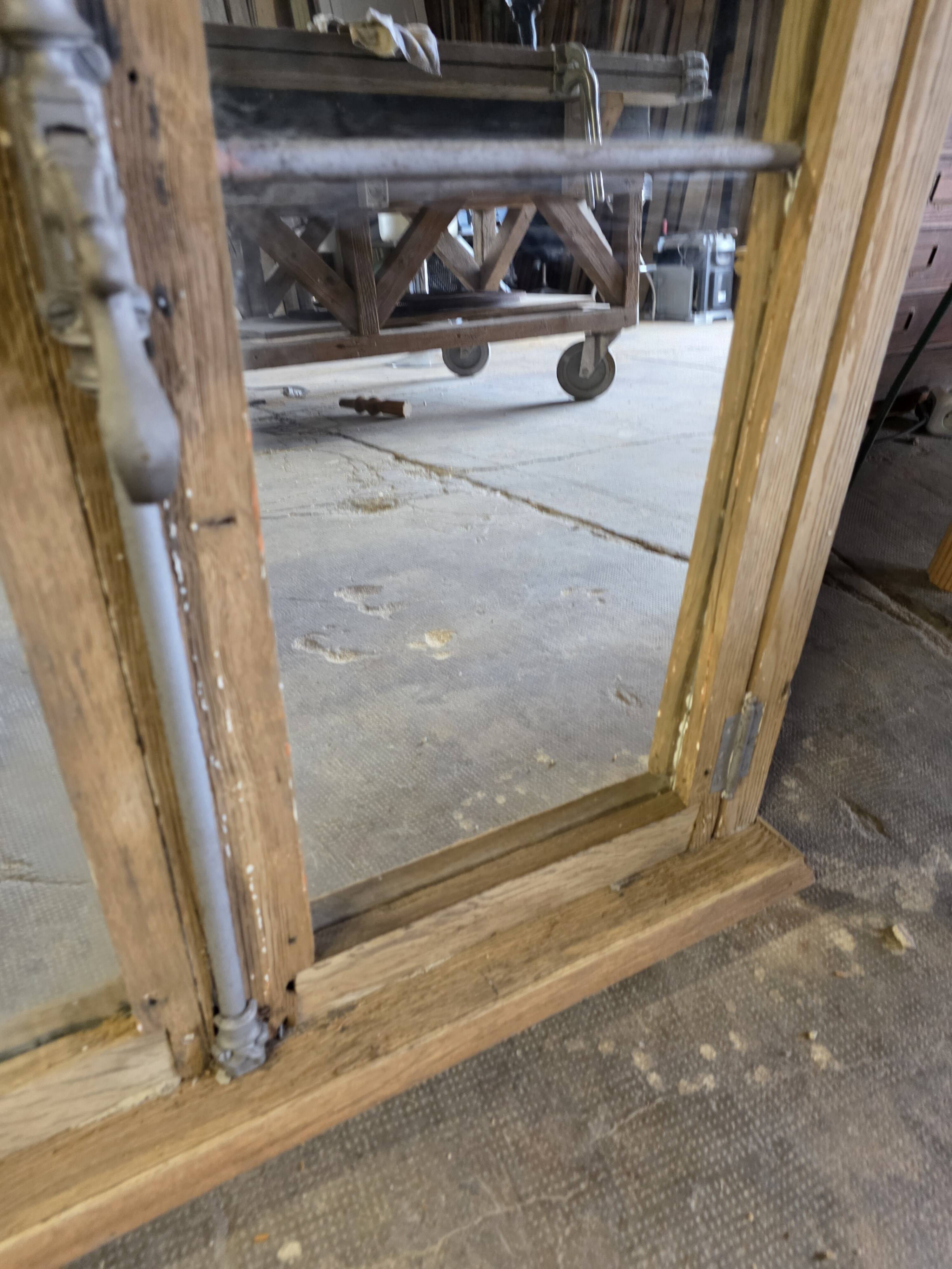 Eighteenth-century oak window mirror.