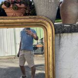 Large Louis-Philippe gilded mirror with gold leaf