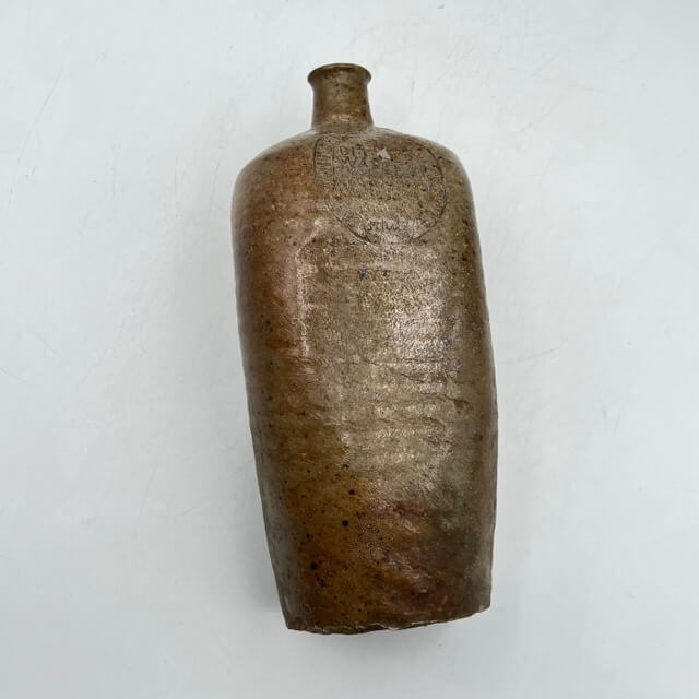Engraved and square stoneware bottle