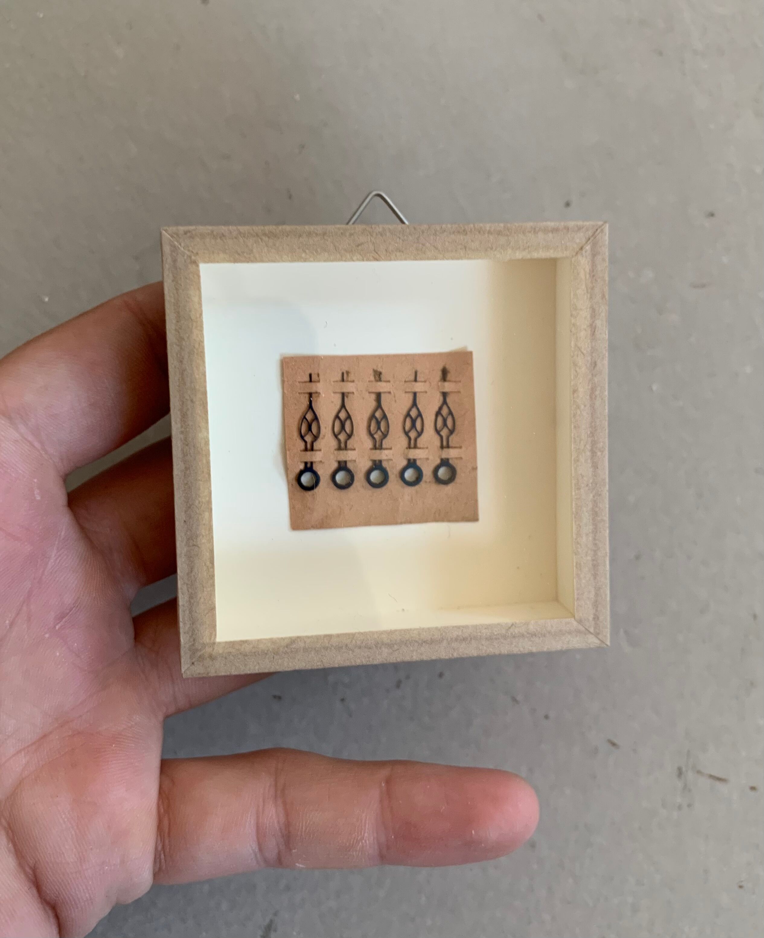 Miniature frame, antique pocket watch hands