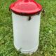 Old milk pot in enamelled sheet metal
