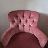 A pair of small tub chairs.