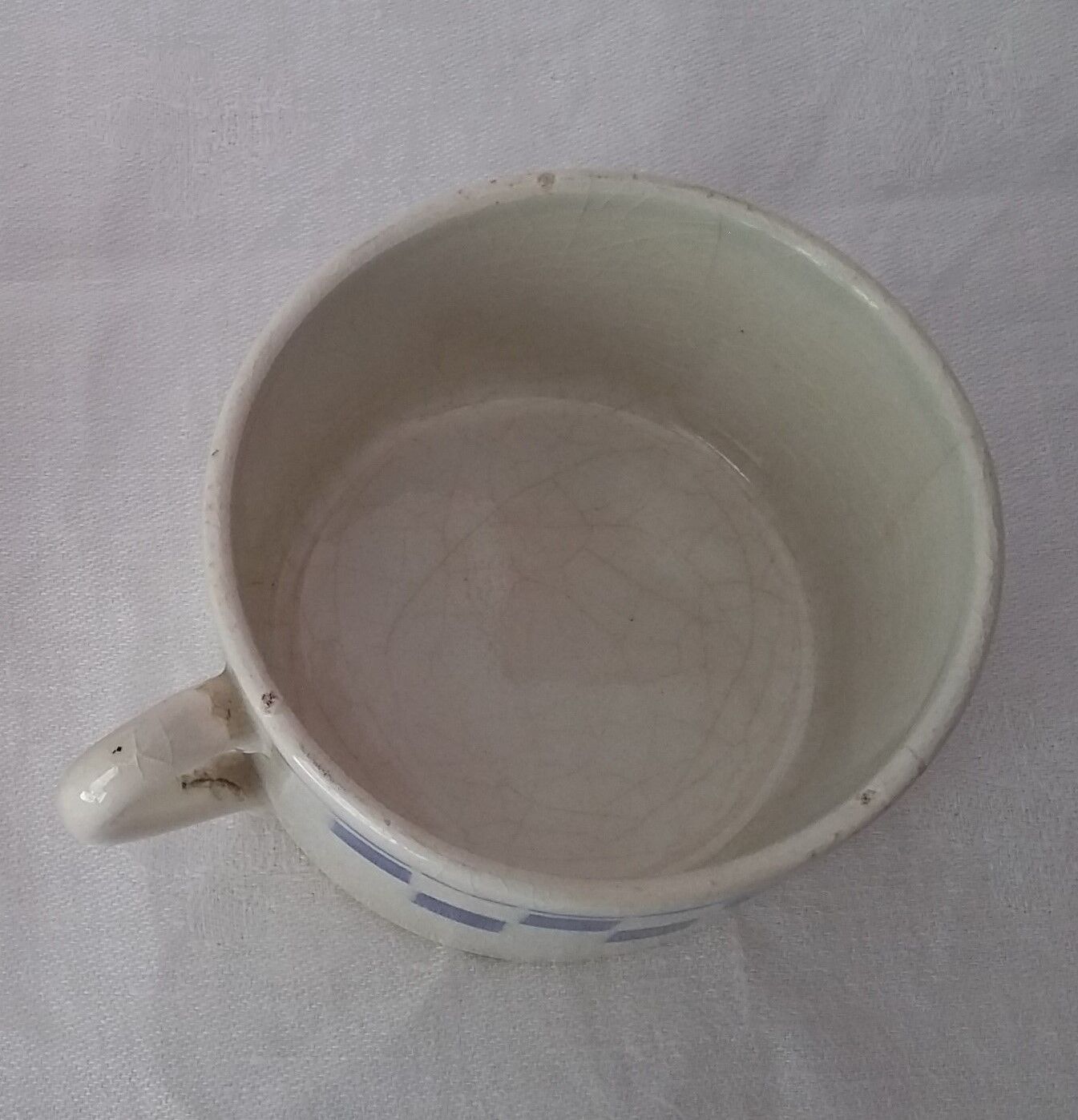 Blue checkerboard cup