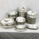 Limoges porcelain service decorated with flowers, mid XXth 57 pieces