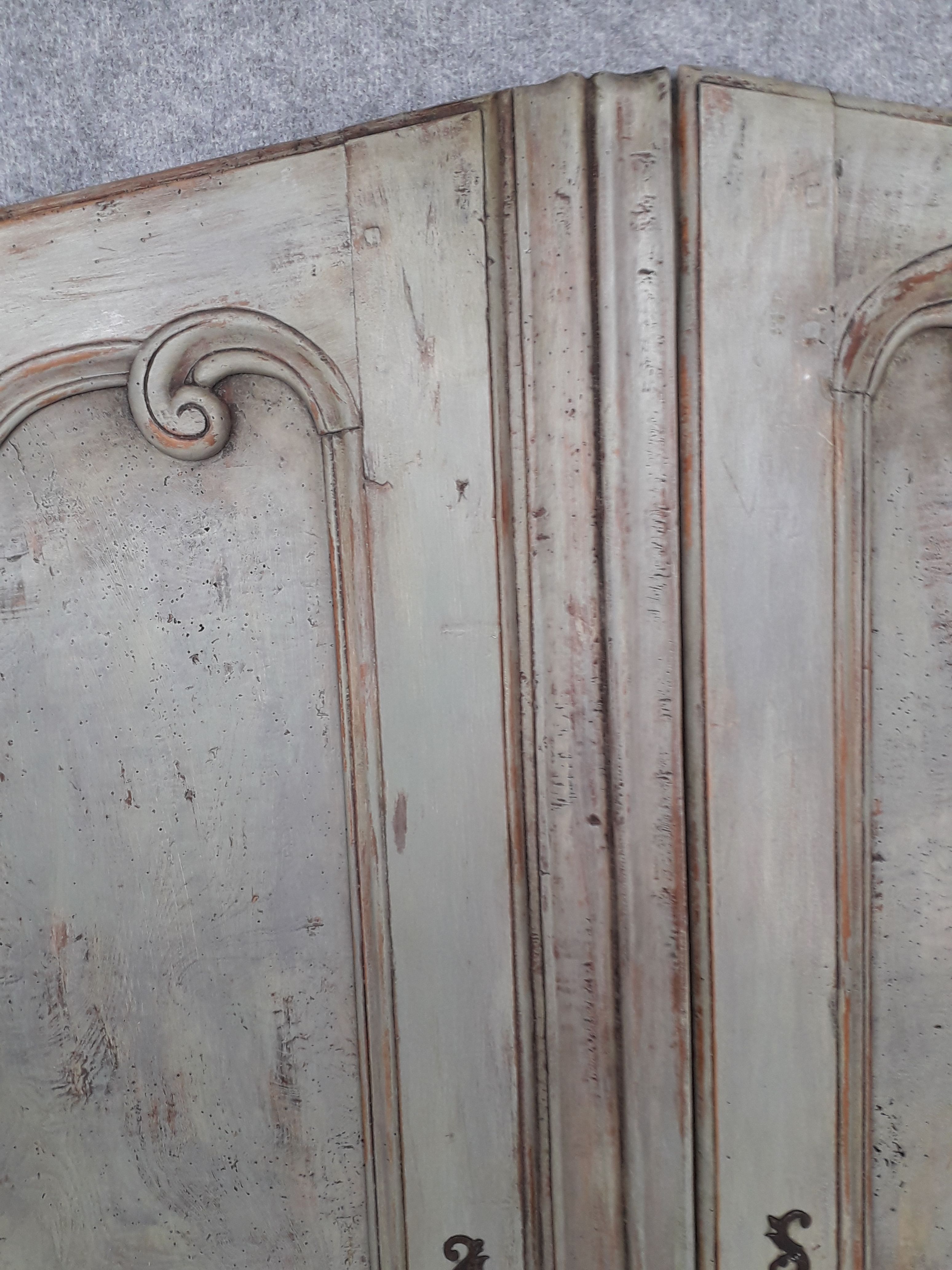Pair of Louis XV period walnut and ash cabinet doors