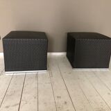 Pair of black synthetic rattan poufs from Flamant