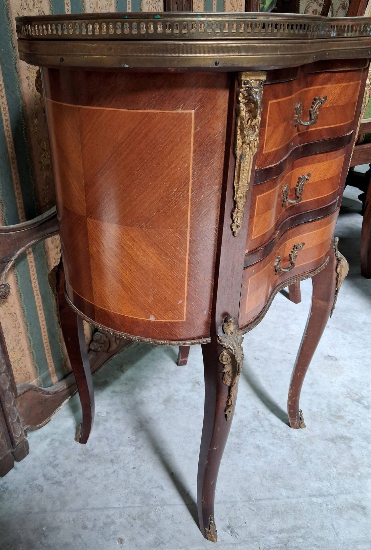 Lady's demi-lune commode in Louis XV style with marquetry and gilded bronze.