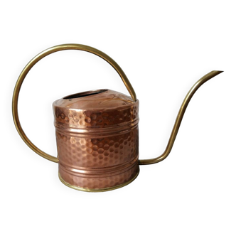Old hammered copper watering can