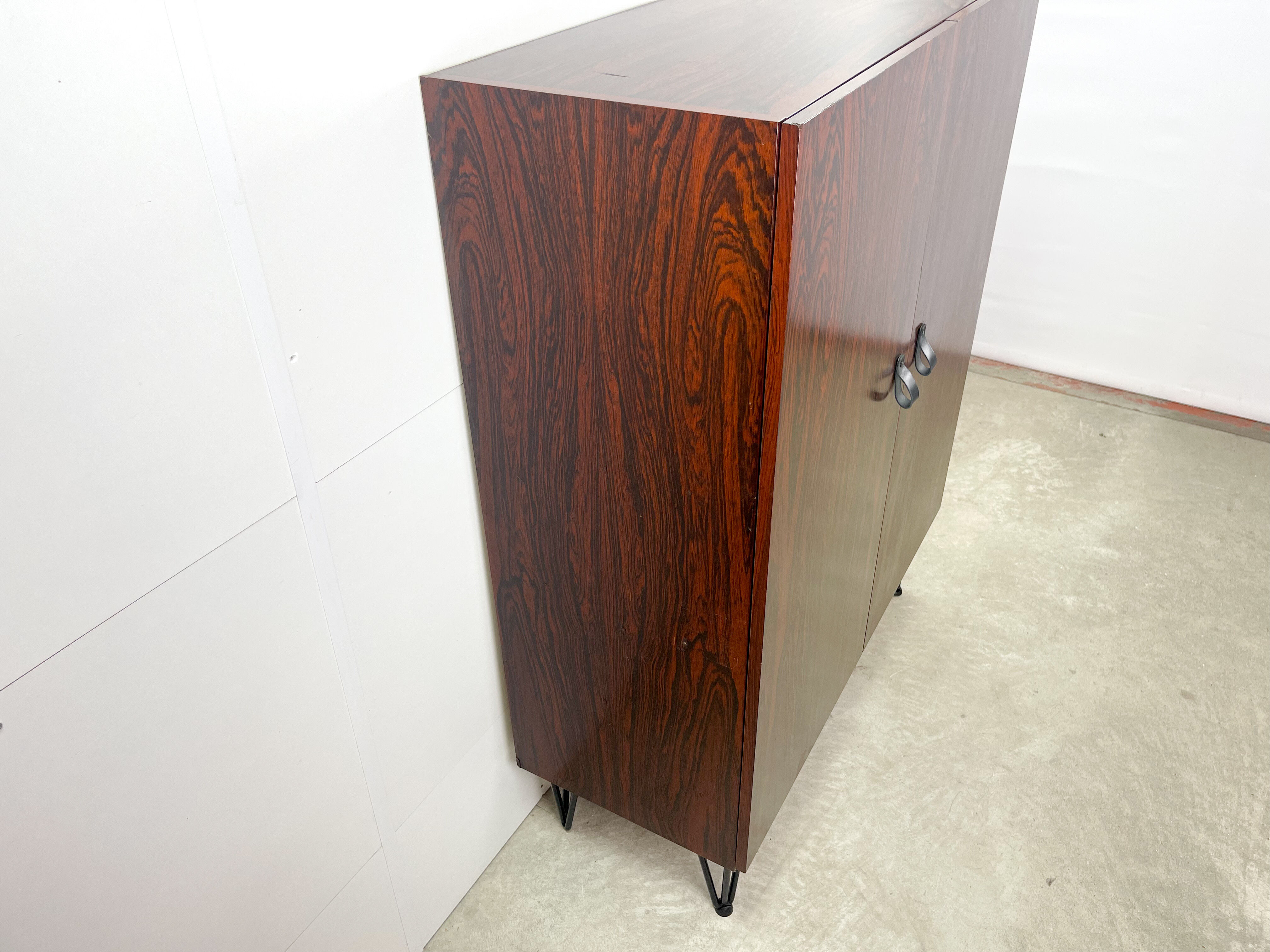 Rosewood cabinet with hairpin legs