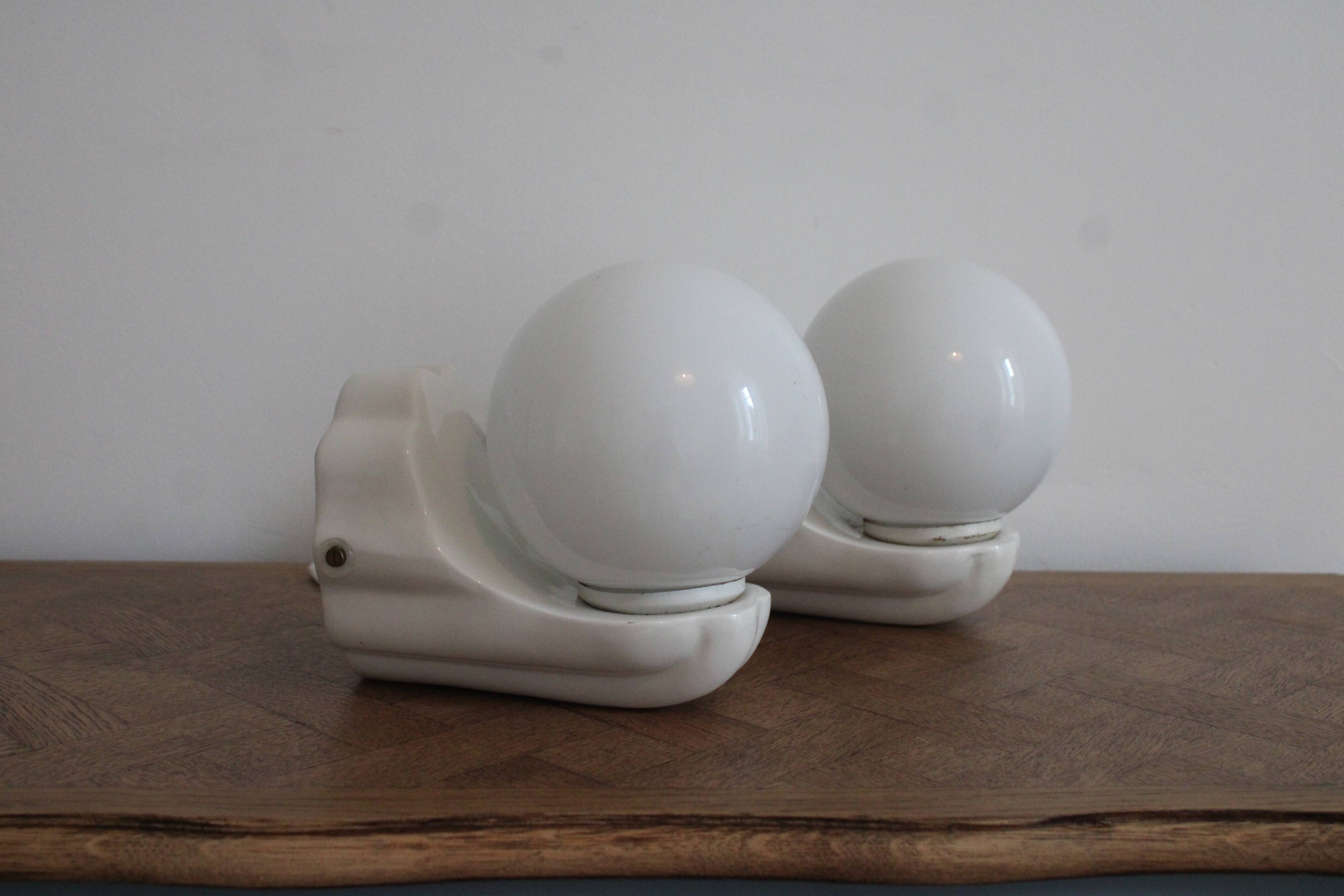 Pair of white ceramic wall lights, Bauhaus style, Italy