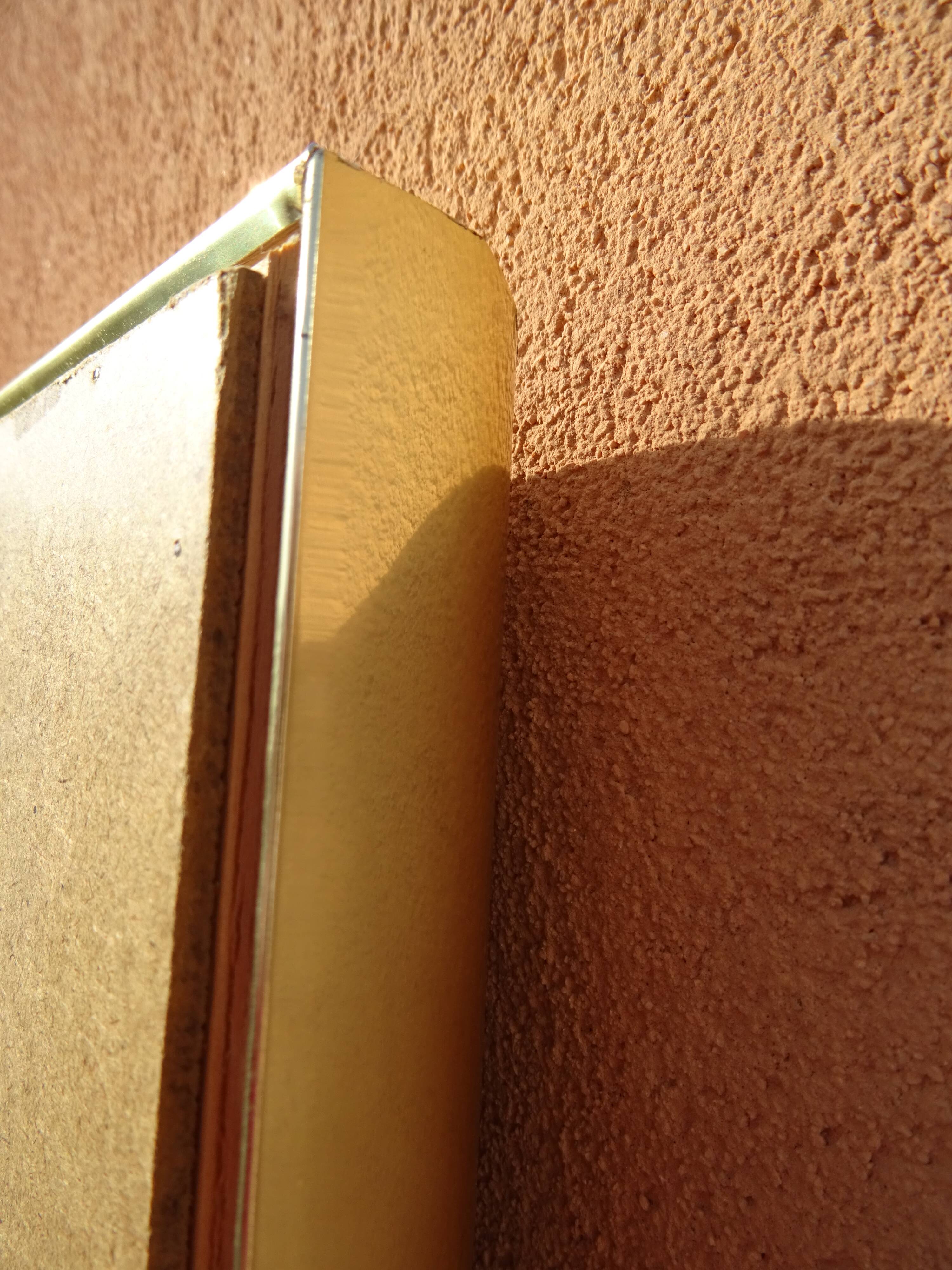 Brass and plexiglass mirror, 80s design