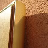 Brass and plexiglass mirror, 80s design