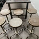 Industrial table with 6 pneumatic stools.