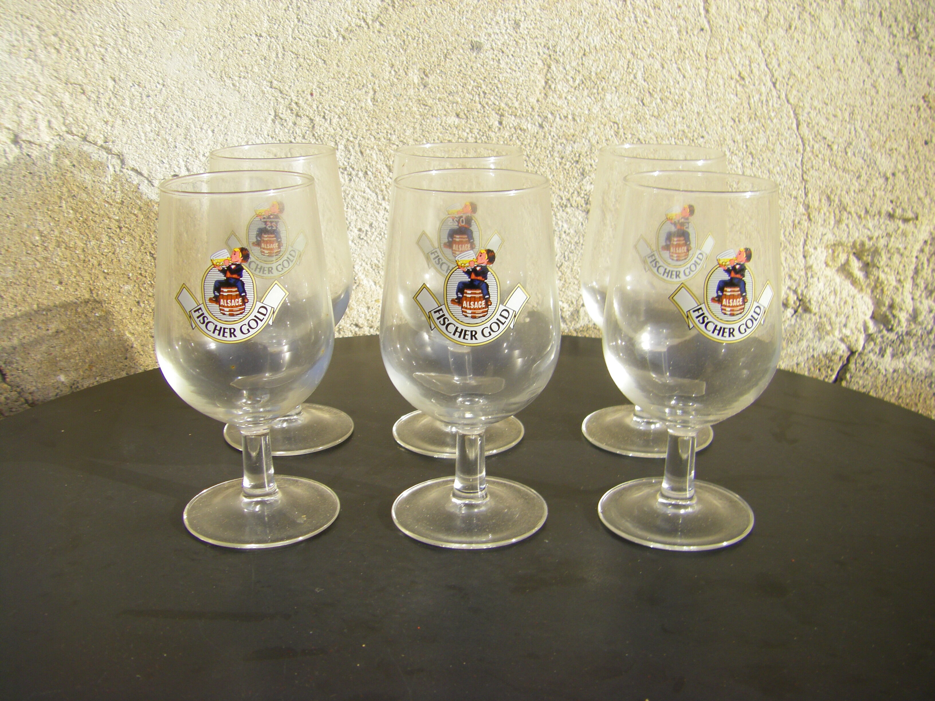 Six Fischer Gold beer glasses