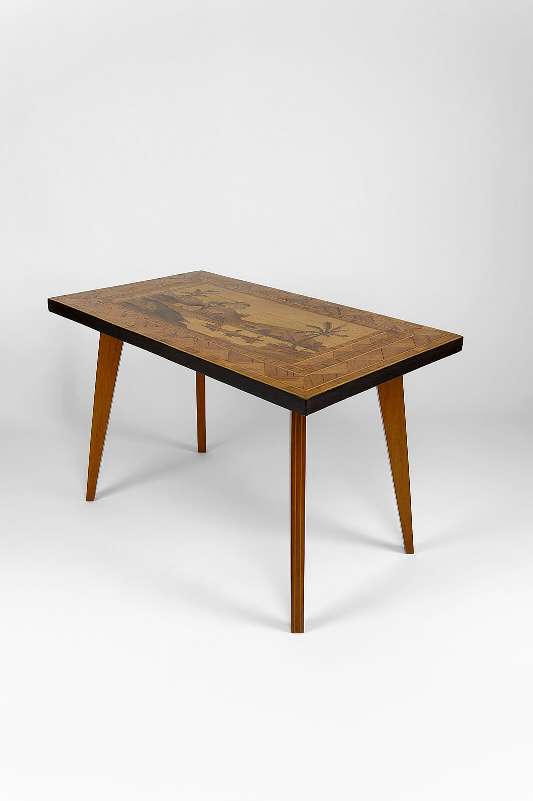African Midcentury coffee table in inlaid wood, circa 1960