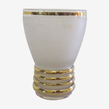 Vase in granite and gilded glass.