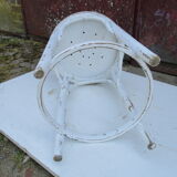 Old curved wooden stool revisited patinated white