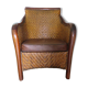 Woven rattan armchair and exotic wood in colonial style, 1980s.