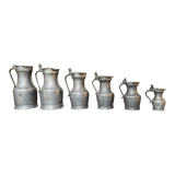 Série de 6 pichets anciens en étain