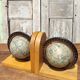 Pair of greenhouses vintage wooden books world map