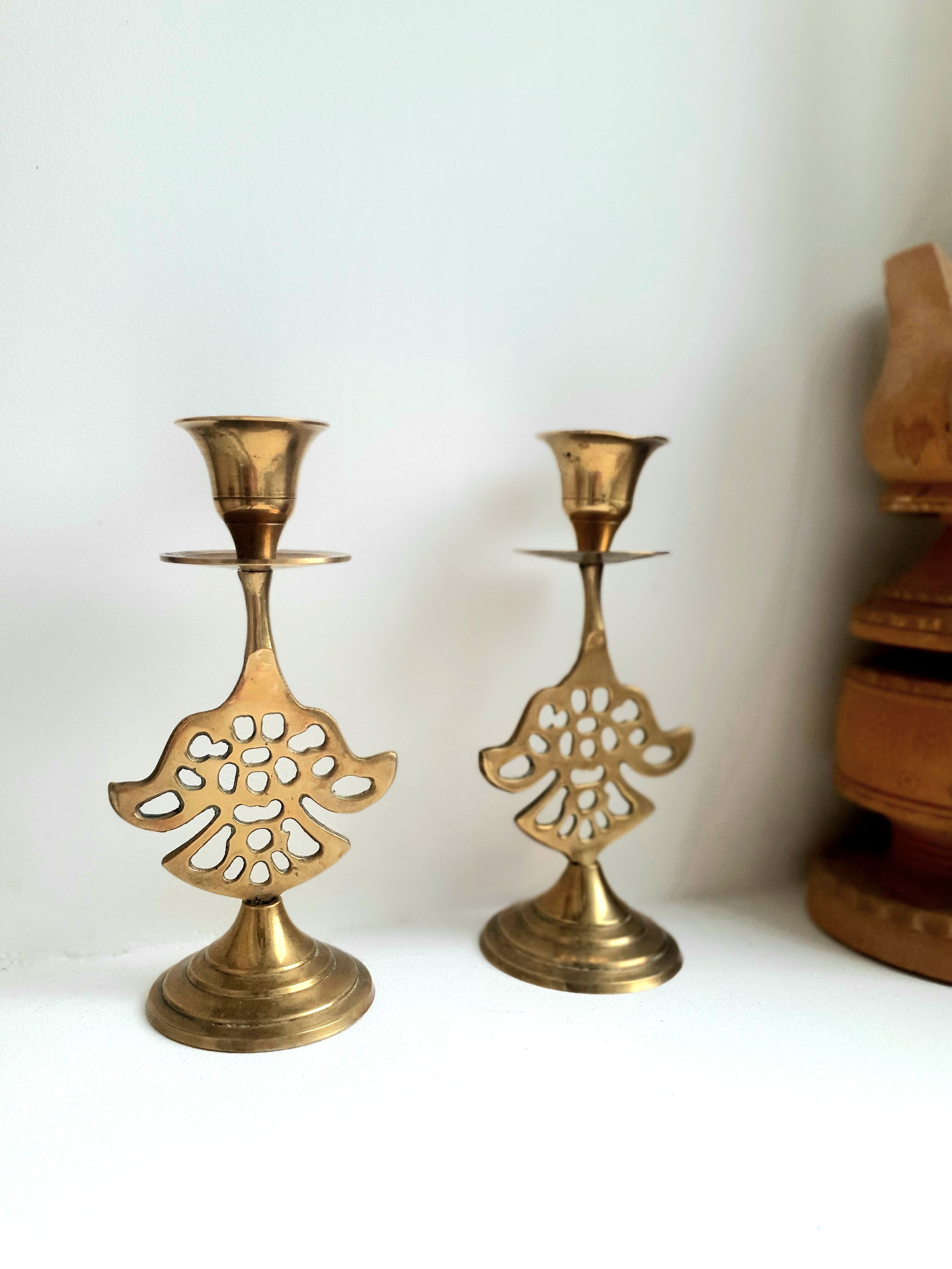 Pair of golden brass candle holders