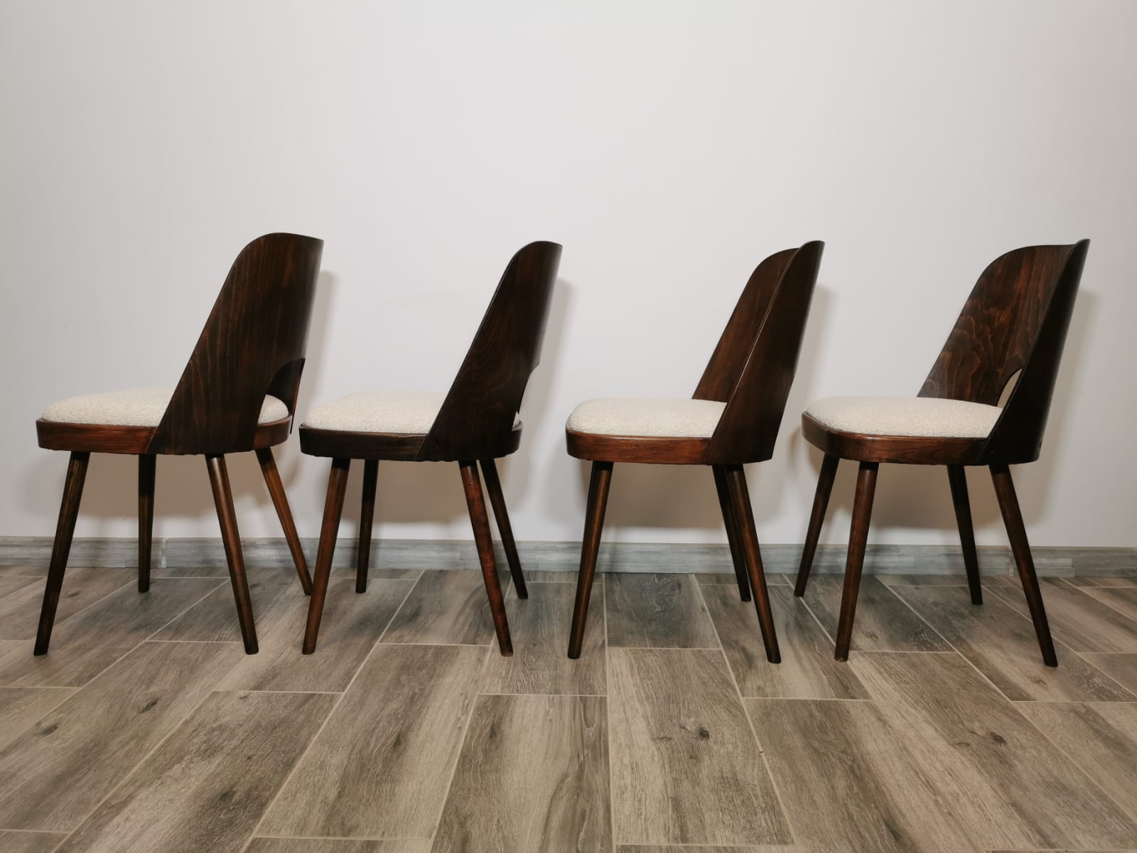 Dining chairs by Oswald Haerdtl