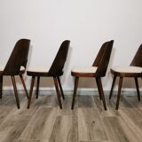 Dining chairs by Oswald Haerdtl