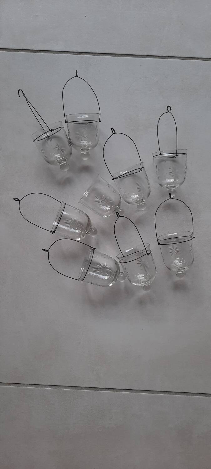 Set of hanging glass and metal tealight holders