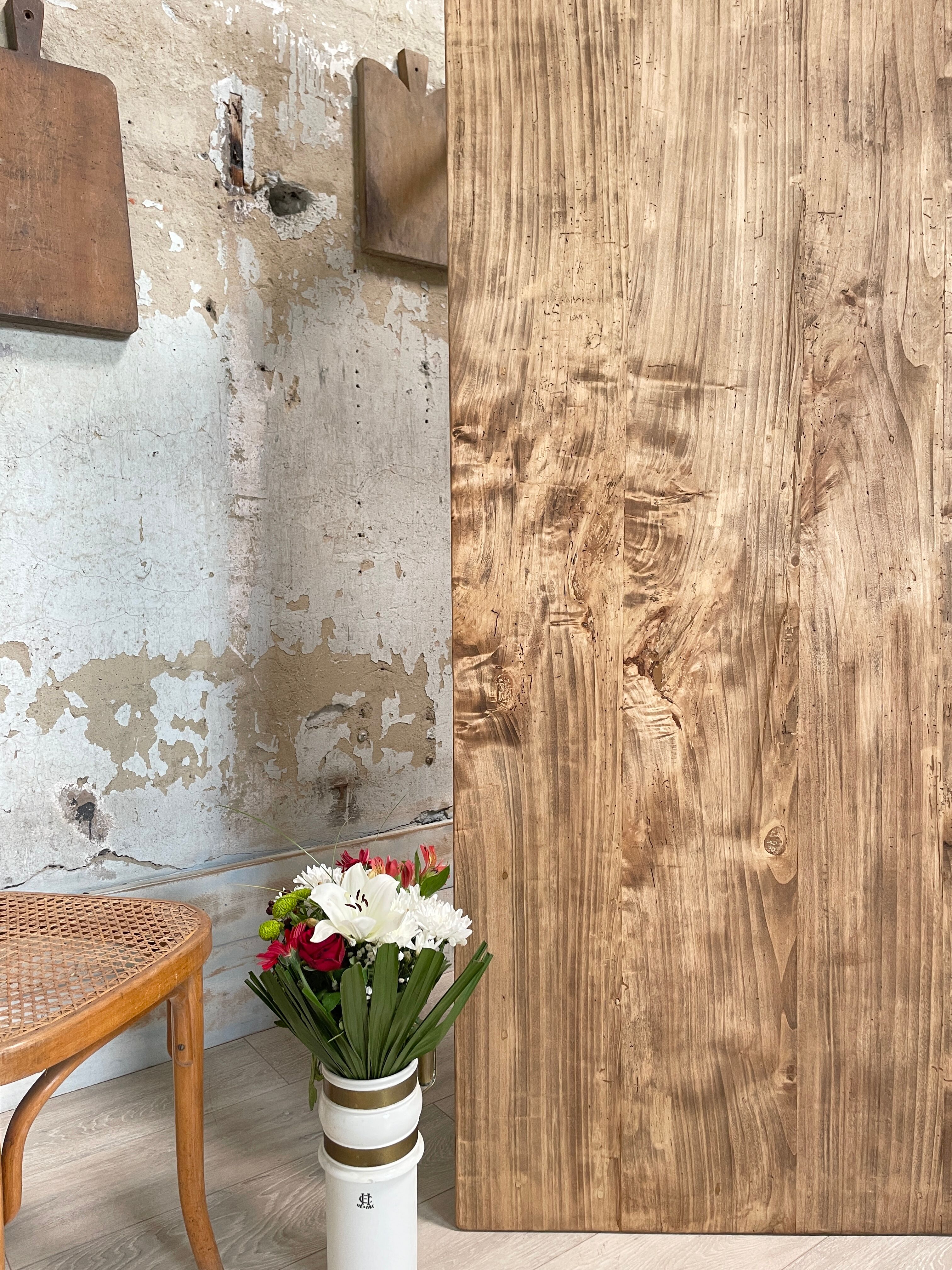 Vintage farmhouse table with turned legs.