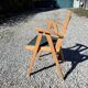 Compass leg armchair
