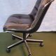 Charles Pollock armchair from the 80s – Leather, metal, plastic.