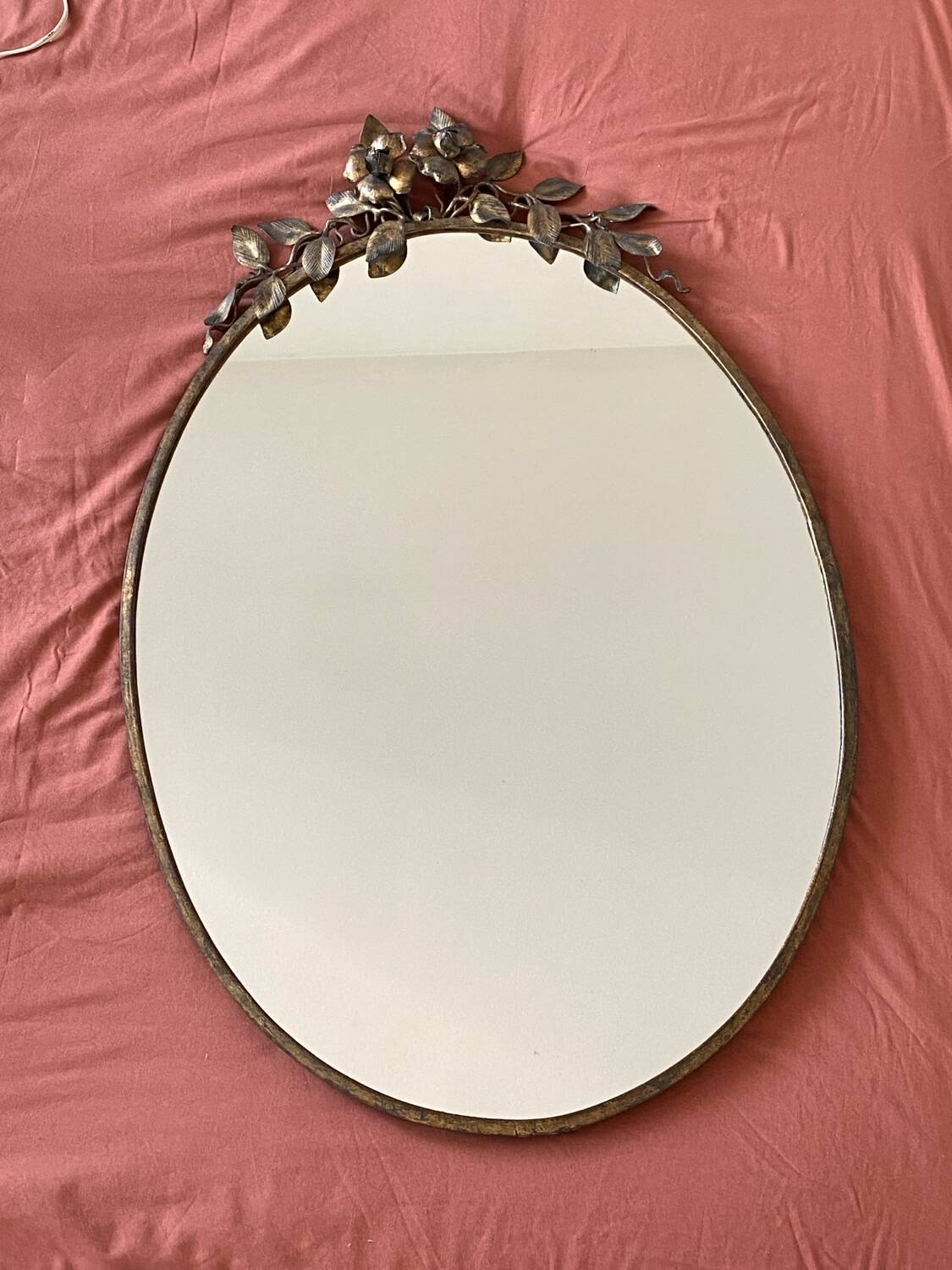 Old bronze frame mirror