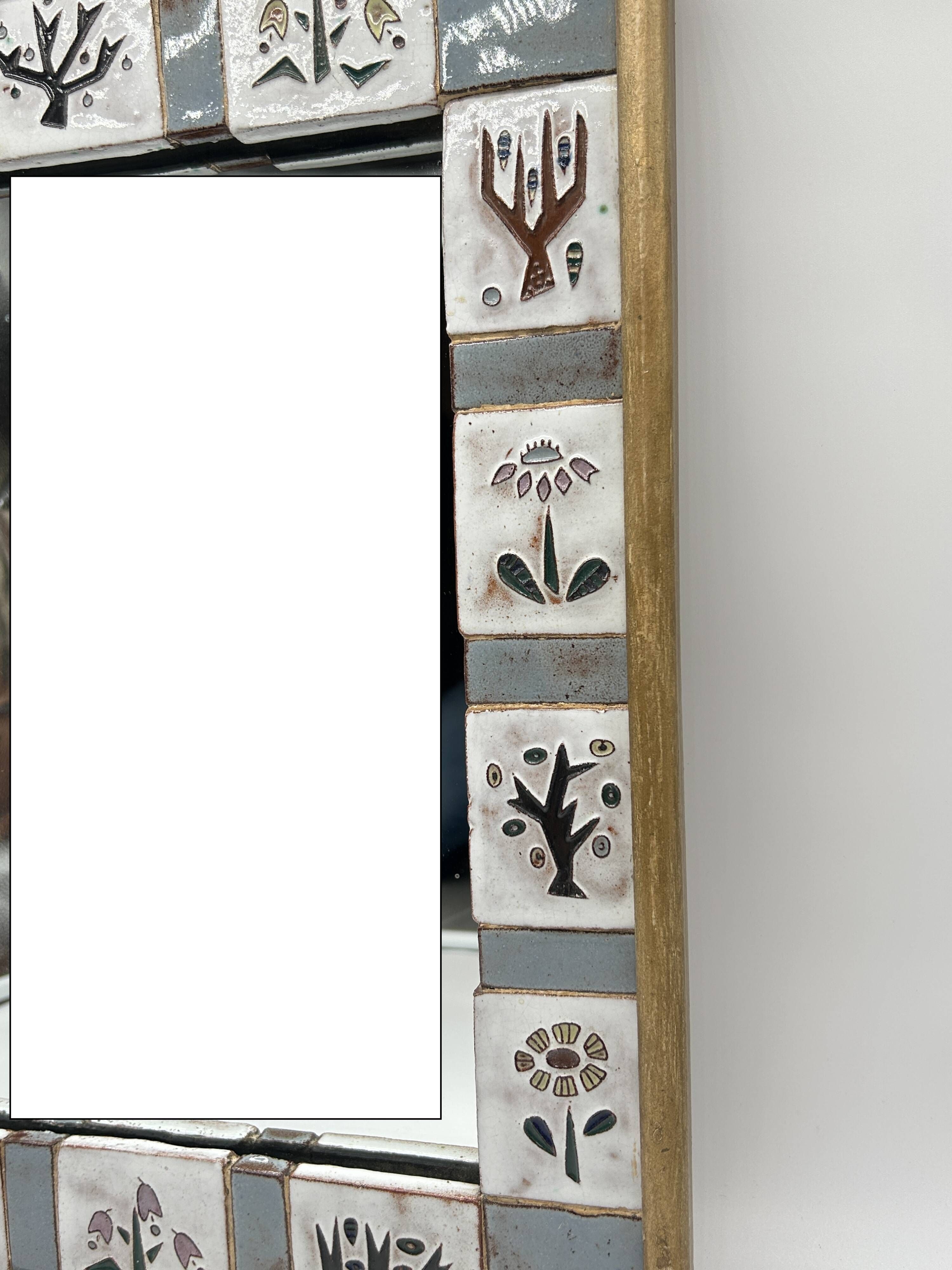 Ceramic enamelled mirror in the style of Odette Dijeux.