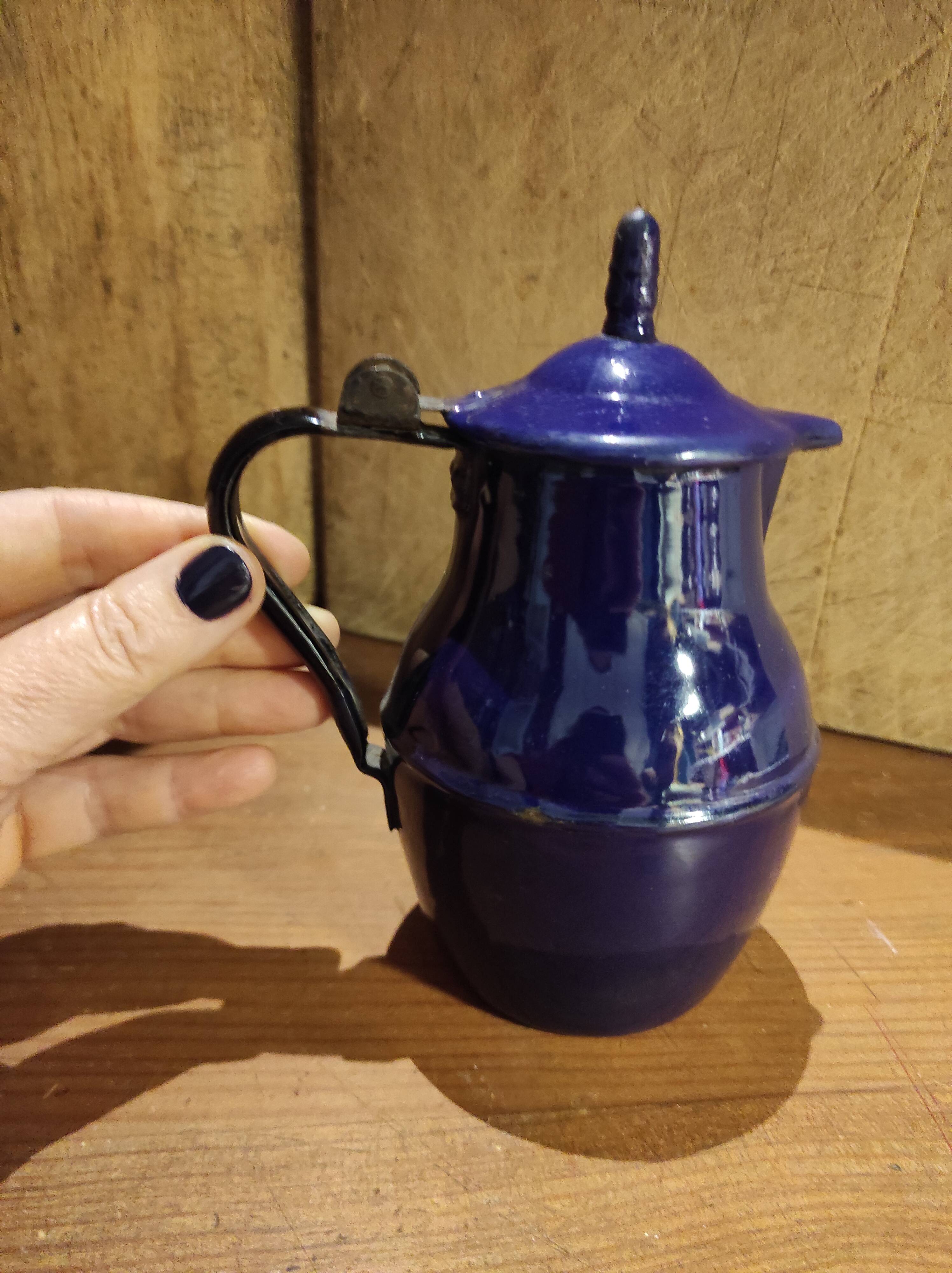 Small vintage French jug with lid, in blue enamel