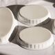 Set of 4 white porcelain dishes with blue decorations and wicker stands